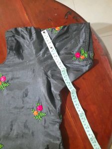 Embroidered black churidhar top