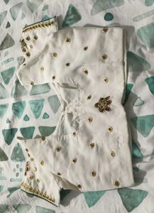 Elegant White Saree with Embellishments