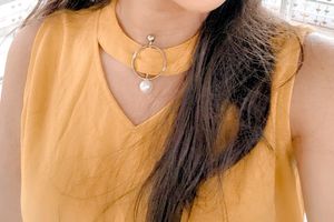 Mustard Sleeveless Top with Ring Detail