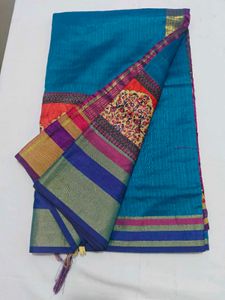 Vibrant Teal Saree with Colorful Border