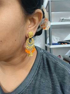 Gold Jhumka Earrings with Orange Beads