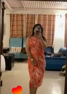 orange ethnic motif dress