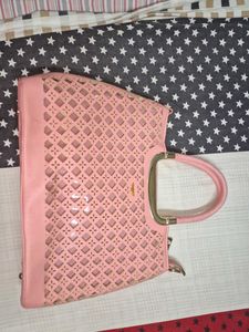 Chic Pink Perforated Handbag