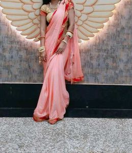 Elegant Pink Saree with Red Border