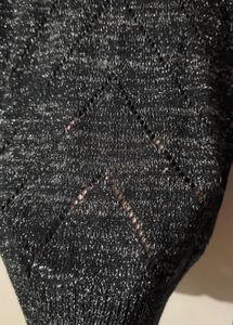 Black stylish top with shimmery interlacing
