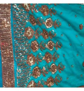 Elegant Teal Saree with Embellished Border