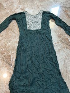 Elegant Teal Kurta with Intricate Neckline