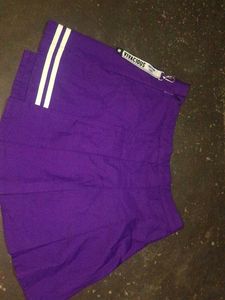 white tee with purple skirt