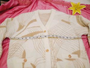 Cozy Cream Cardigan with Unique Pattern