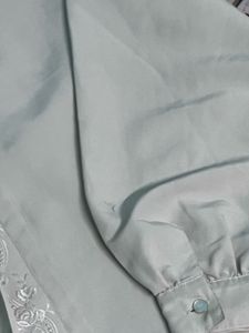 cream colored embroidery detail shirt