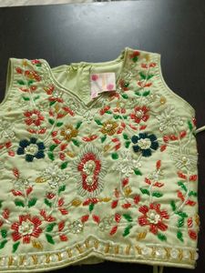 Embroidered Sleeveless Blouse and lehenga