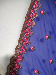 Blue Saree With Flowers Design
