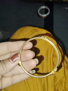 Set of Golden Bangles and 1 singe bange watc