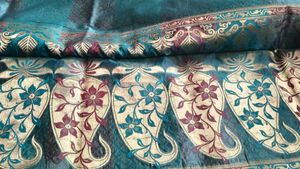 Elegant Teal Floral Brocade Saree