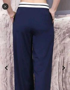 Button closure contrast waistband pleated pants