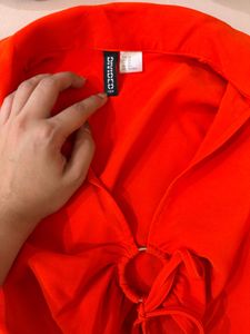 H&amp;M Divided Orange Ring Front Top