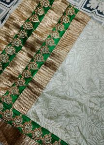 Grand Cream Saree with Green-Golden border