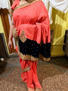 Elegant Peach Saree with Blue Border