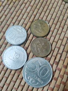 Collection of Assorted Coins from 4 countries .