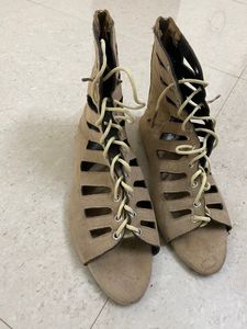 Beige tie-up flat sandals