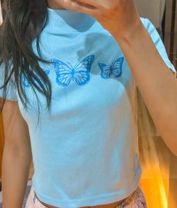 the pretty blue tops with butterfly