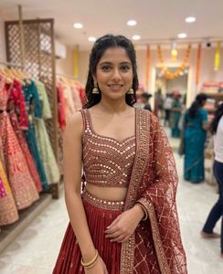 Stunning Red Embellished Lehenga Choli