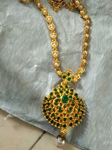 Stunning Gold Necklace with Green Stones