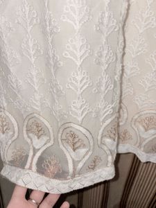 Elegant White Chikankari Kurta with golden embelli