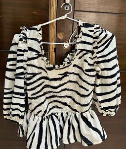 Zebra Print Smocked Peplum Top