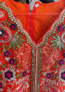 Flowing Orange Ethnic Skirt with choli and jacket