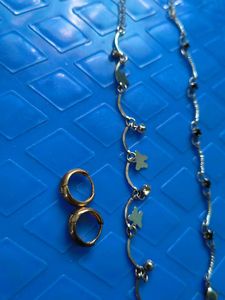 Two anklets and a pair of earings