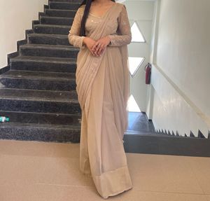 Elegant Beige Embellished Saree