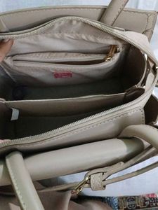 Chic Taupe Textured Handbag with Scarf Accent