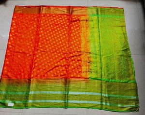 Vibrant Orange Silk Saree with Green Border