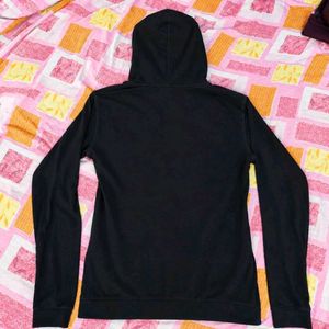 Black hoodie with "LUCKEY" graphic