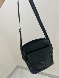 Victoria cross leather bag