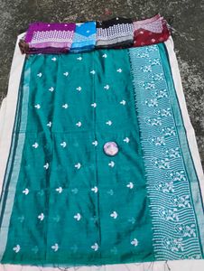Elegant Teal Saree with White Floral Embroidery