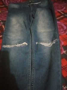 Ripped Knee Jeans