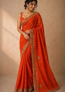 Vibrant orange Embellished Saree