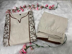 Elegant Beige Embroidered Kurta Set