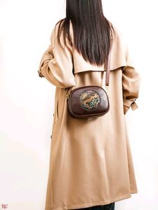 Chic Elephant Embossed Crossbody Bag