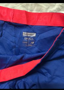 Blue Athletic Shorts with Pink Trim