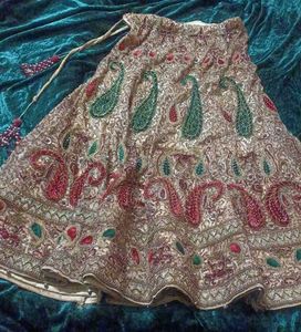golden lehenga with maroon dupatta