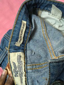 Distressed Denim Jeans