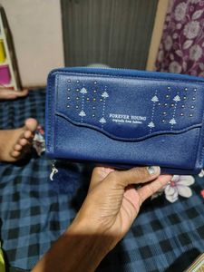 Blue Zip Around Wallet with Pom Char