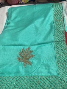Elegant Teal Saree with Gold Embroidery