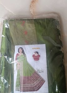 Elegant Green Saree with Maroon Border