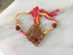 resin diamond shape floral rakhi