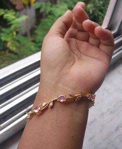 Elegant Rose Gold Bracelet with Pink Stones