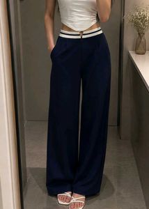 Button closure contrast waistband pleated pants